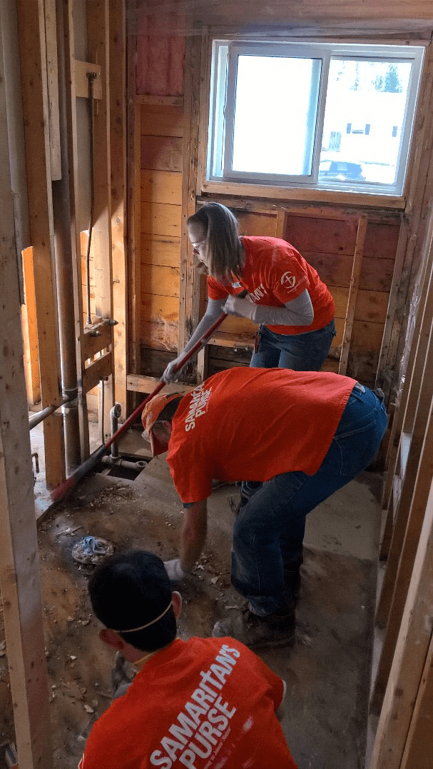 Samaritan's Purse trained volunteers help to remove mud, water and damaged possessions from basements from flooded homes in New Brunswick.