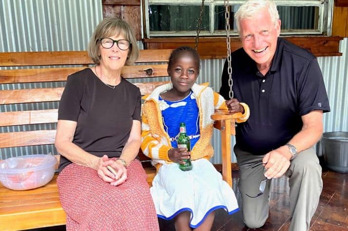 Ben and Cathy Sawar spend time with one of the children at Kapsowar Mission Hospital and training school in Kenya.