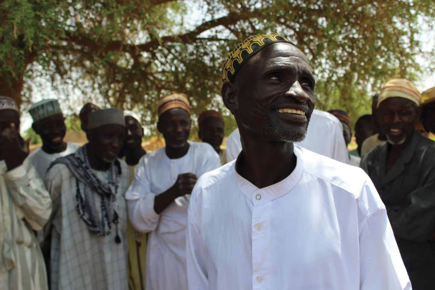 Zakari Yao is filled with joy over the transformed crops in his community.
