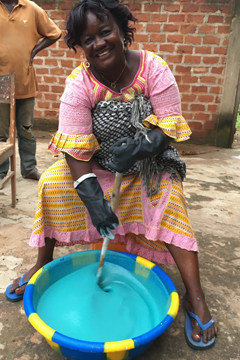 Students and teachers in the Democratic Republic of the Congo make their own soap.