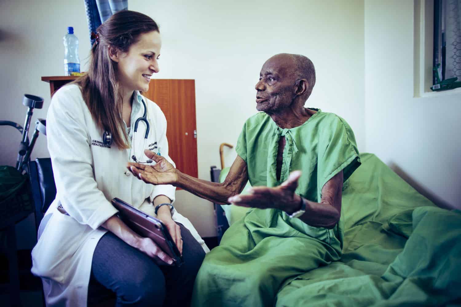 Though anemic and weak, John insisted in sitting up to witness to God’s goodness when Dr. Blumer and students made their rounds.