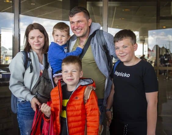 Roman and Olha Koval, and their three sons, Oleh, 11, Taras, 7, and Yurii, 3, are among a group of people fleeing the war from Ukraine, arriving at a terminal at Toronto Pearson International Airport on a plane from Poland, operated by Samaritan’s Purse Canada on Sunday, May 15, 2022. ERNEST DOROSZUK/TORONTO SUN