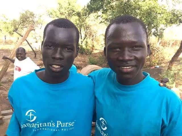 “Water is everything because it serves us to drink, to cook, to bathe and to lay bricks,” said 16 year old Robert Djara John (right), who aspires to become a doctor. John helps to oversee one of Calgary-based Samaritan’s Purse’s wells that provide water to some of the one million South Sudanese refugees in Canada. Traveling alone, John zigzagged by foot for two weeks across South Sudan before finding sanctuary in South Sudan. As for his family: “Honestly, I don’t think that I will ever see them again.” Matthew Fisher / Postmedia News