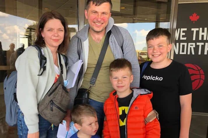Olha Koval and her family arrived in Toronto Sunday to unite with their relatives. The family fled Ukraine in March and spent two months gathering visas and documents before their arrival. (Paula Duhatschuk/CBC)