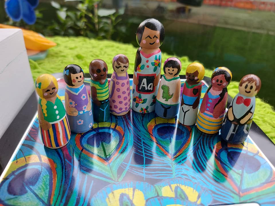 Nicole Chicote item loves to paint peg people, designed to “wow” the child when they open their shoebox.