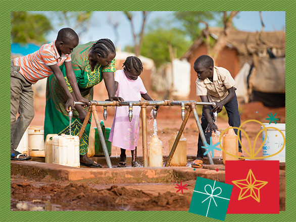 Before the installation of a water filter, children like Kakada gather around a communal hand pump, representing the daily risk they faced from unsafe water sources.